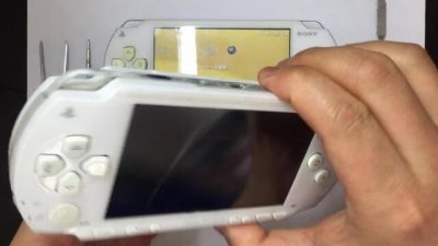 ​psp1000怎么下载游戏（psp1000方向键失灵)